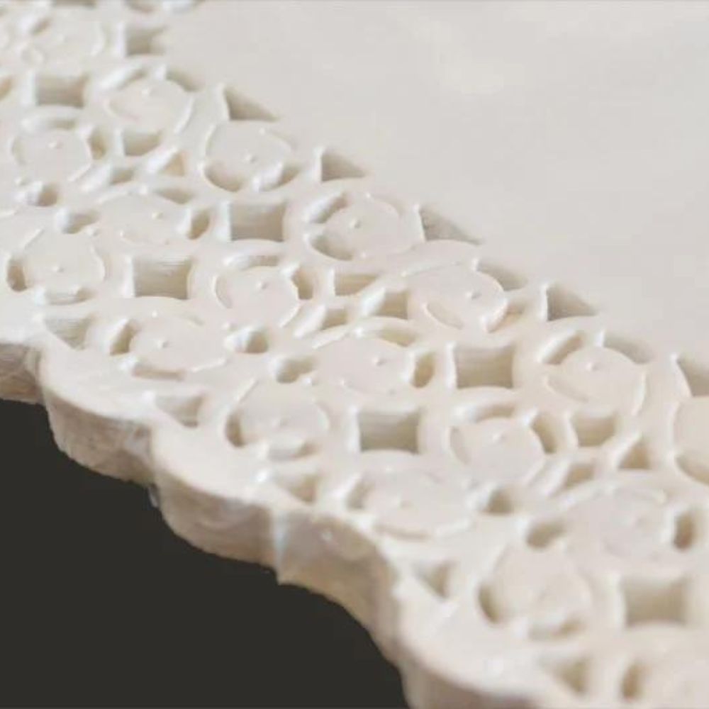 Centrino di pizzo in carta bianca per pasticceria  cm 14x24 Pz 100